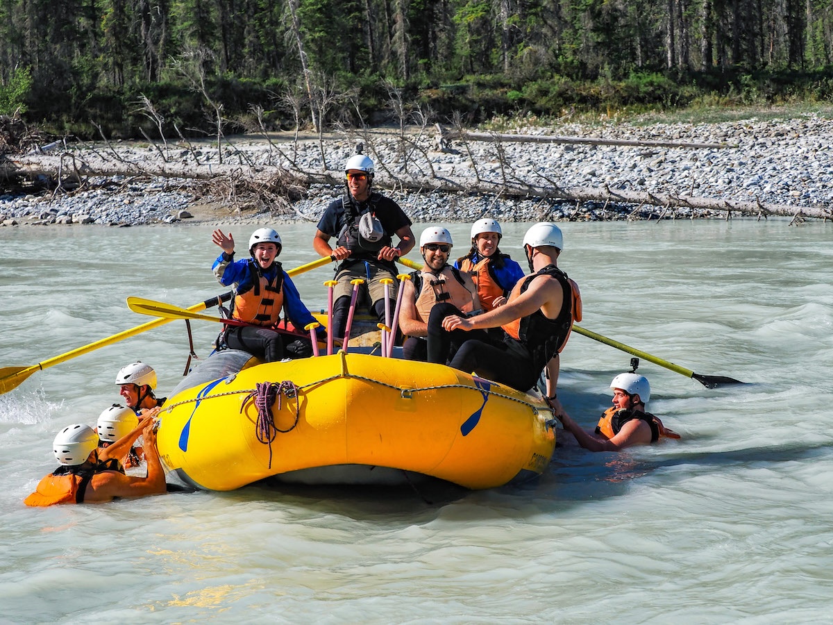 Glacier Rafting guides leading a white water rafting trip on the Kicking Horse River