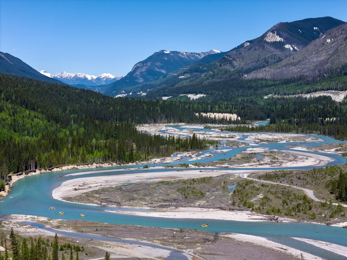 Glacier Rafting guides leading a white water rafting trip on the Kicking Horse River