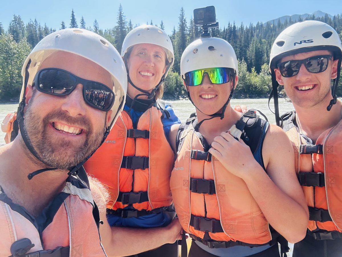 Teenagers enjoying white water rafting on the Kicking Horse River in Golden